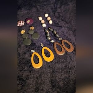 Assorted earrings, some are clip ons, and some are pierced earrings